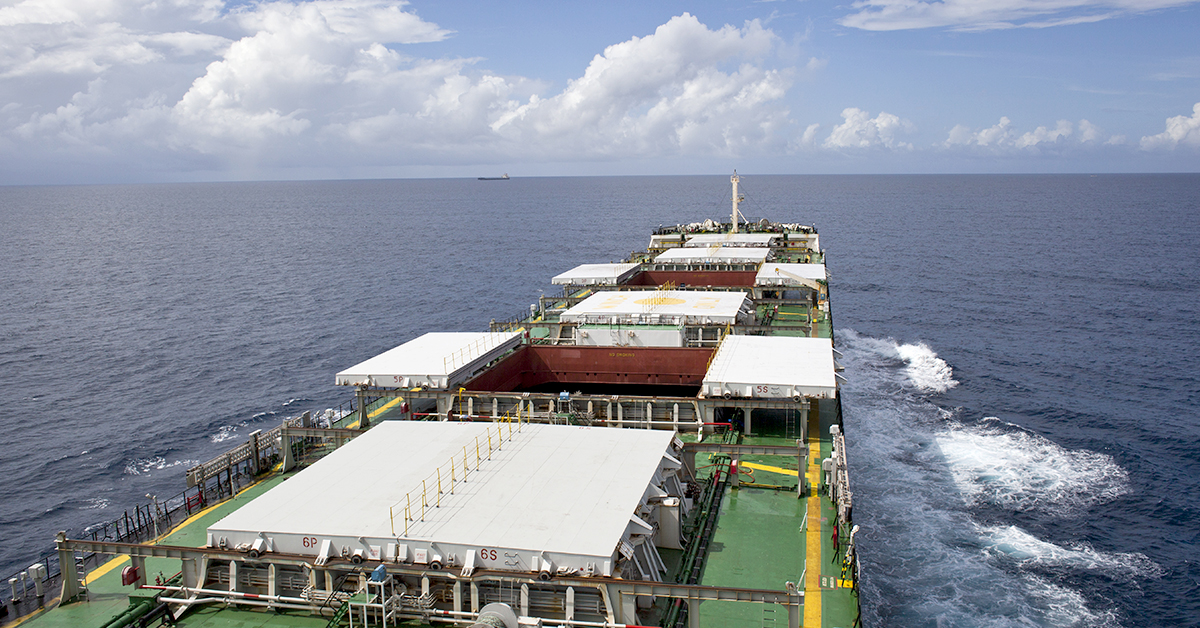 A modern commercial vessel undergoing technical survey with IACS unified requirements applied.