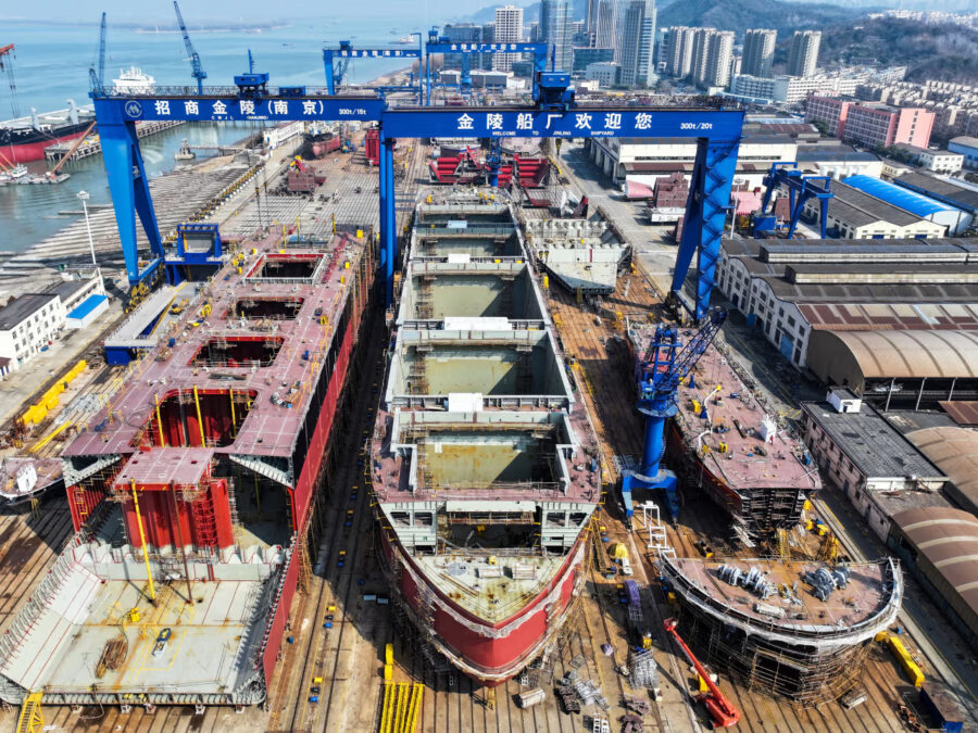 Commercial cargo vessel under construction in a drydock, representing newbuilding delivery schedules and yard capacity.