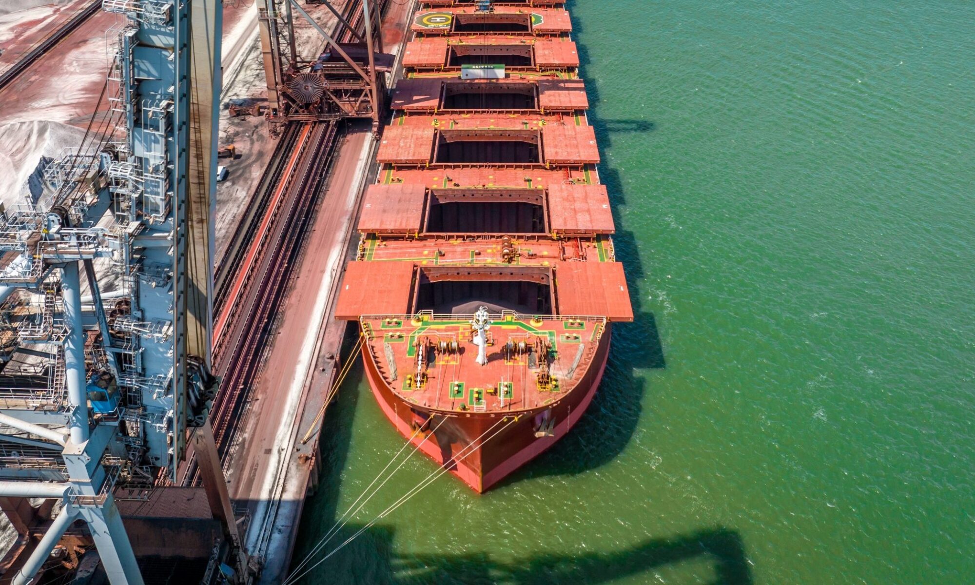 A large bulk carrier navigating open waters, representing global dry bulk chartering trends.